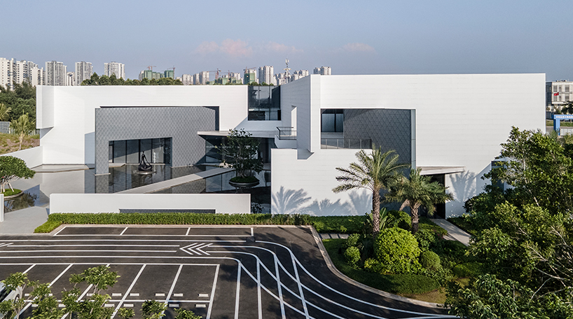 intersected white walls form geometric retail center + art gallery by aoe architects in china