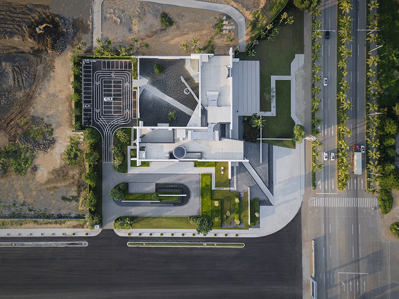 intersected white walls form geometric retail center + art gallery by aoe architects in china