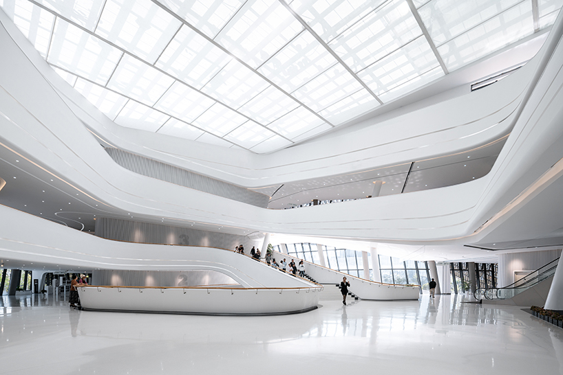 a textured ceramic skin clads playze + schmidhuber's exhibition center in china designboom