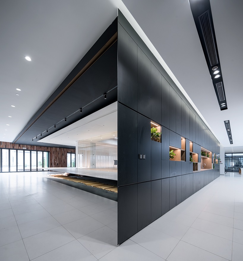 DUTS design creates a 'floating' conference room inside shanghai office renovation designboom