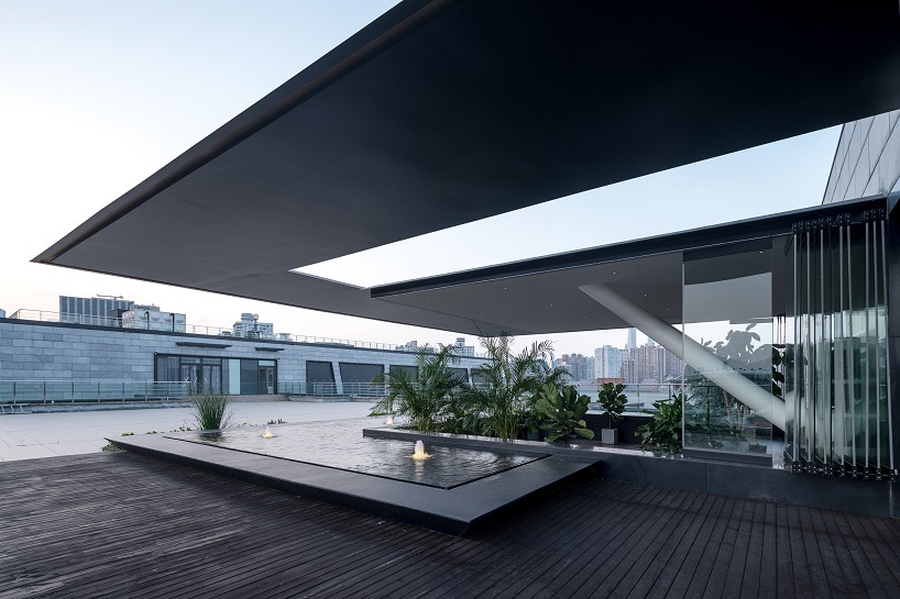 DUTS design creates a 'floating' conference room inside shanghai office renovation designboom