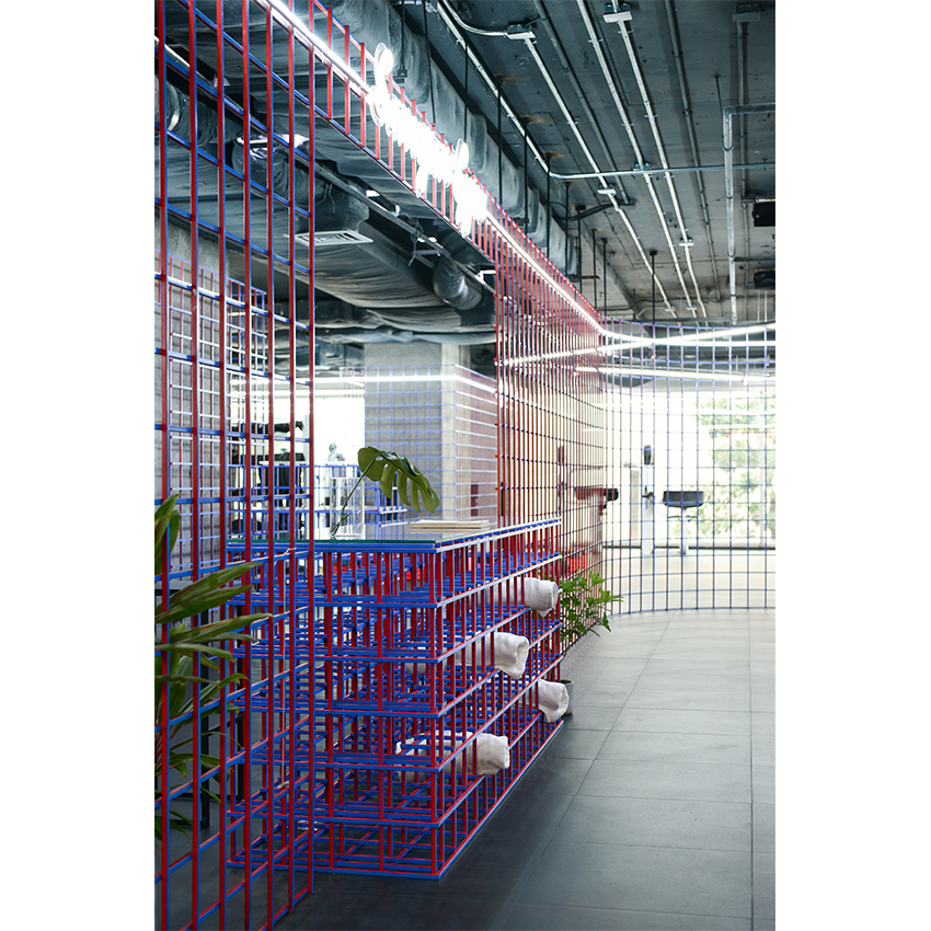 looklen architects builds a colored steel grid system to decorate gym in bangkok designboom