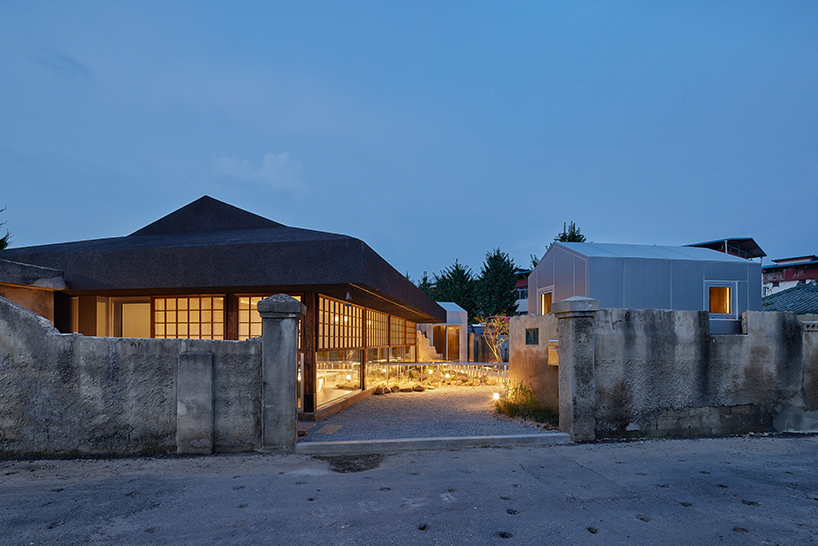 traditional wooden hanok roof frame tops nomal's renovated restaurant in korea - 7