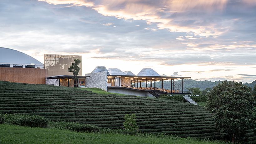 IDIN architects tops the roof of choui fong tea cafe 2 in thailand with conical skylights