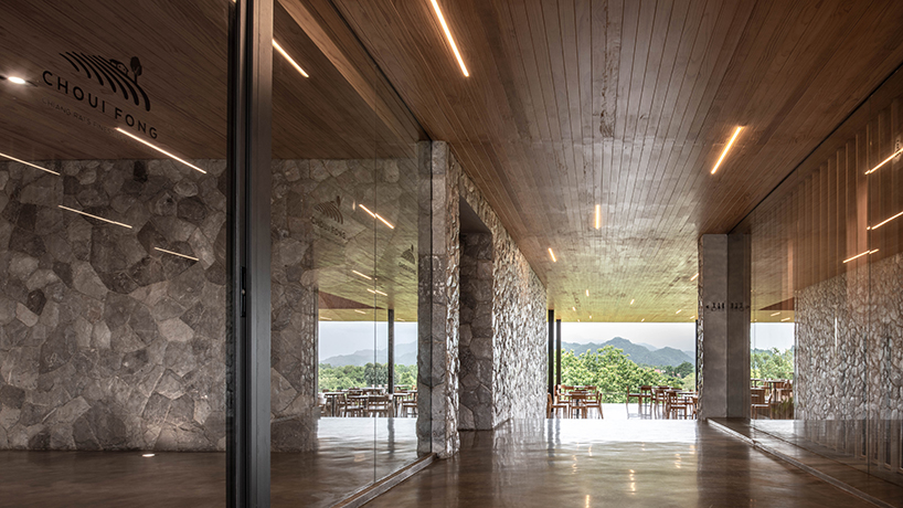 IDIN architects tops the roof of choui fong tea cafe 2 in thailand with conical skylights