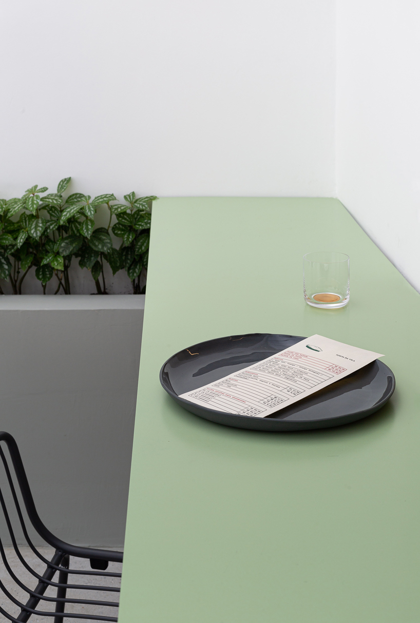 haal dips brazilian restaurant’s interiors into sage green and light grey - 2
