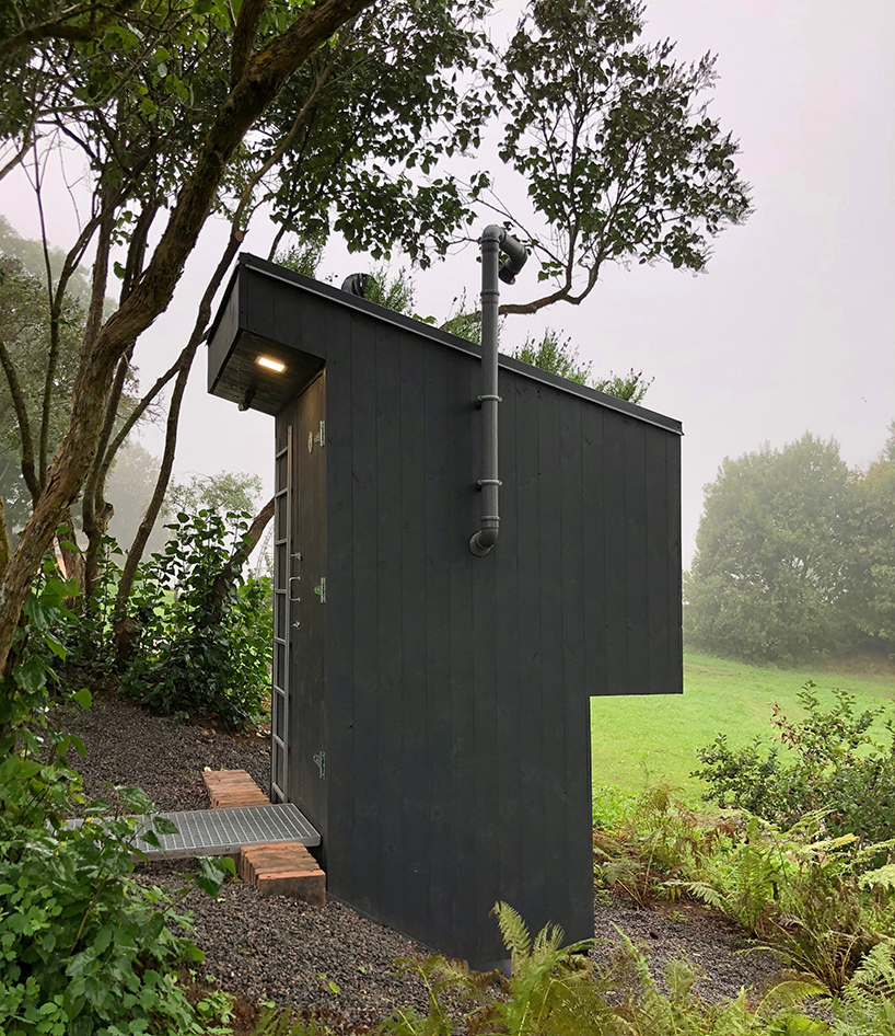zeltini studio's wooden 'temple of poop' is a compost toilet with a view designboom
