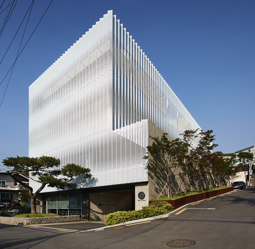 BCHO architects wraps perforated aluminum panels around a multi-use building in seoul designboom