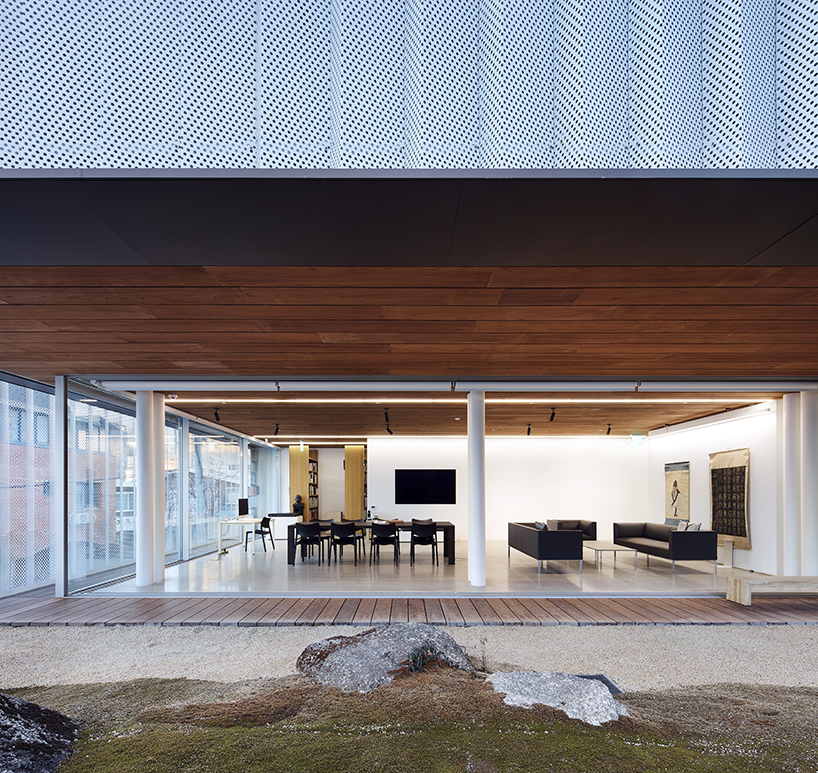 BCHO architects wraps perforated aluminum panels around a multi-use building in seoul designboom