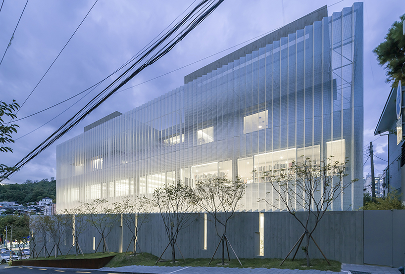 BCHO architects wraps perforated aluminum panels around a multi-use building in seoul designboom