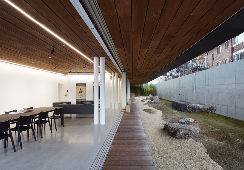 BCHO architects wraps perforated aluminum panels around a multi-use building in seoul designboom