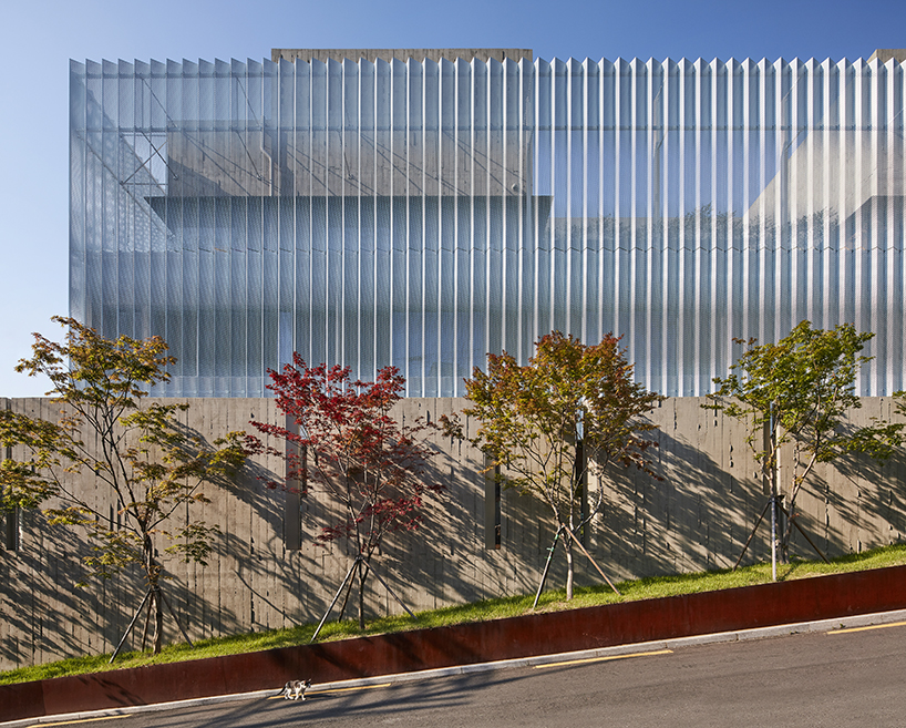 BCHO architects wraps perforated aluminum panels around a multi-use building in seoul designboom