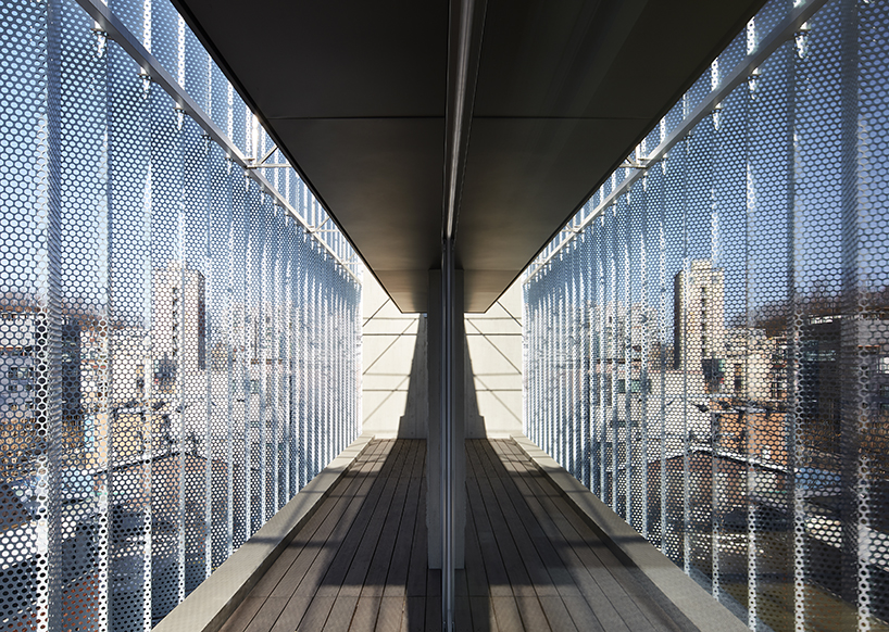 BCHO architects wraps perforated aluminum panels around a multi-use building in seoul designboom