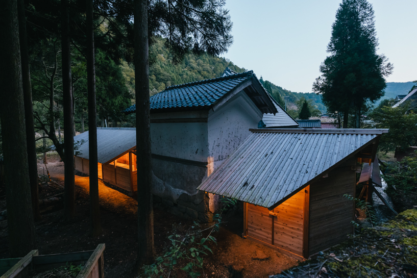 locally sourced wood and traditional japanese joinery shape 2m26's horse stable in kyoto