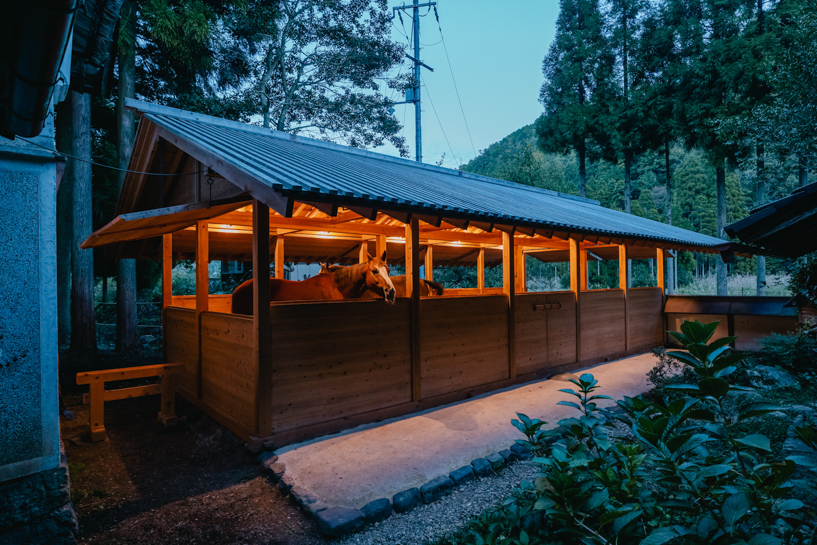 locally sourced wood and traditional japanese joinery shape 2m26's horse stable in kyoto