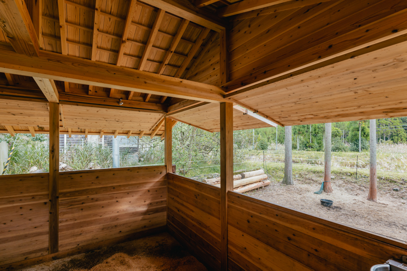 locally sourced wood and traditional japanese joinery shape 2m26's horse stable in kyoto
