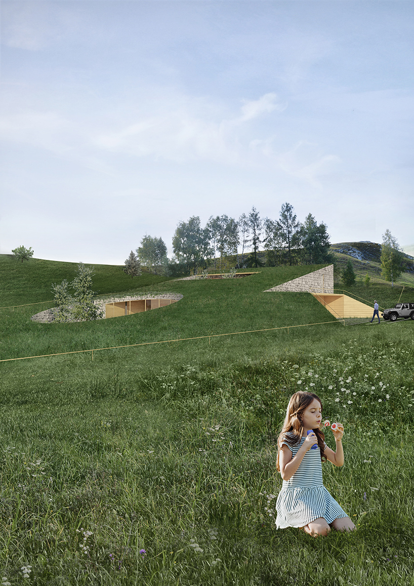adrian kasperski weaves house into the hills of polish landscape