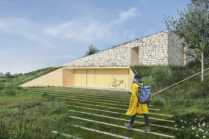 adrian kasperski weaves house into the hills of polish landscape