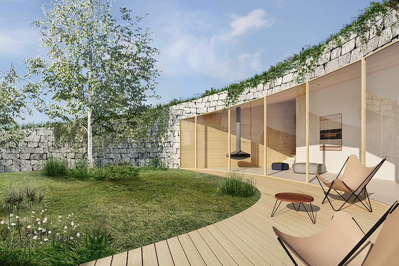adrian kasperski weaves house into the hills of polish landscape