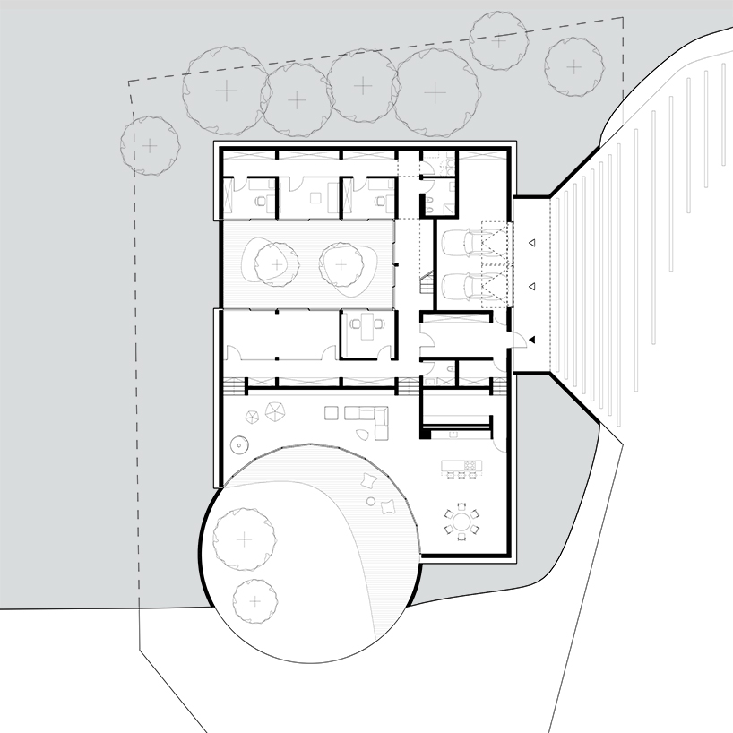 adrian kasperski weaves house into the hills of polish landscape - 5