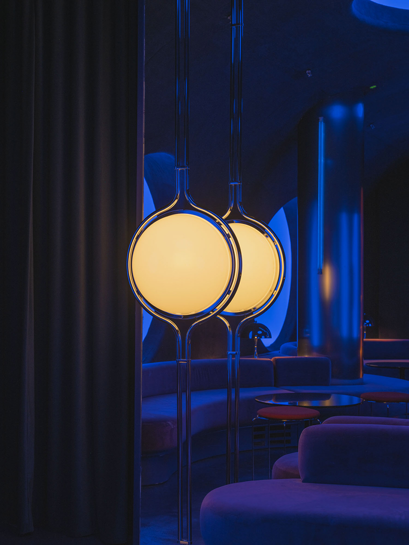 retro cocktail bar with multi-chrome lighting and curved steel hides behind barcelona focacceria - 10