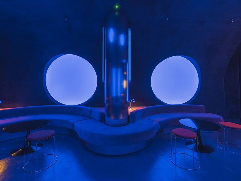 retro cocktail bar with multi-chrome lighting and curved steel hides behind barcelona focacceria - 11