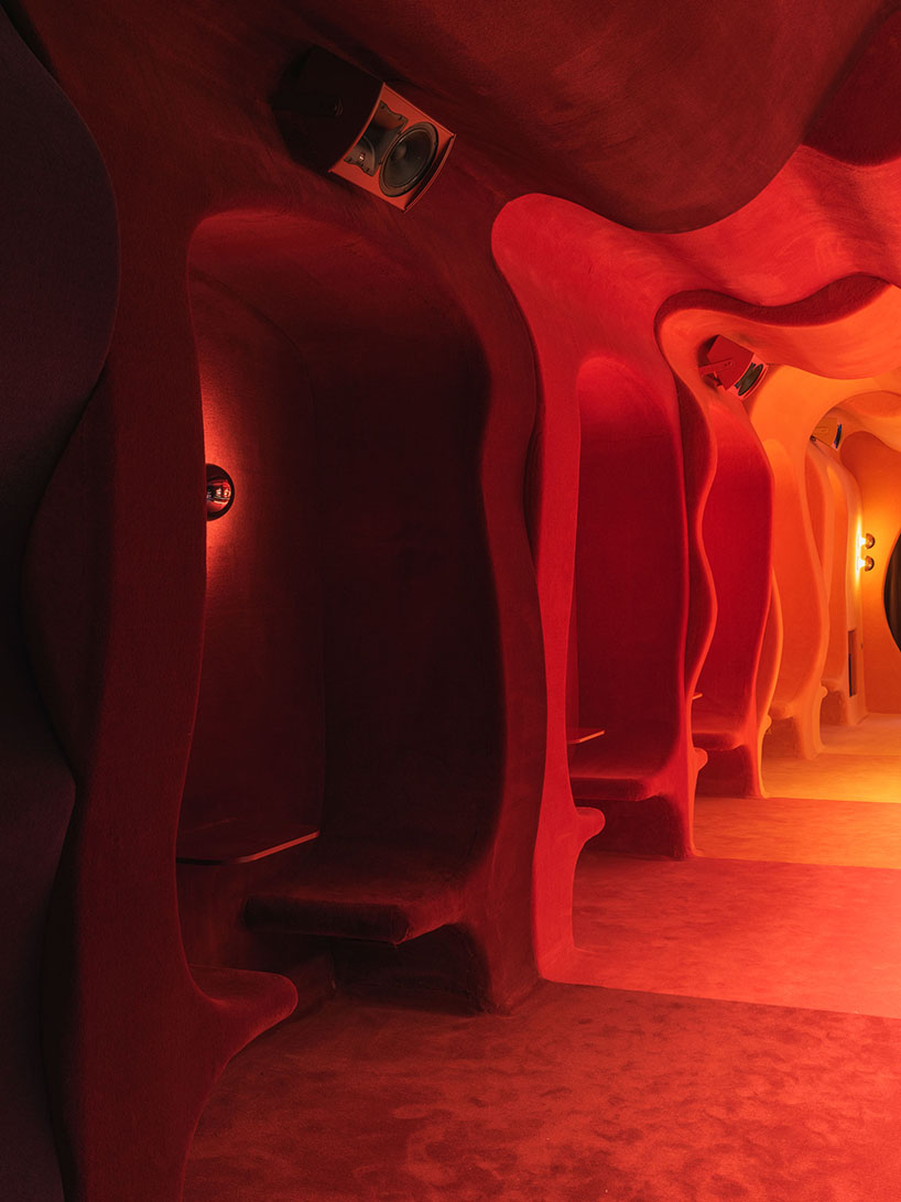 retro cocktail bar with multi-chrome lighting and curved steel hides behind barcelona focacceria - 4