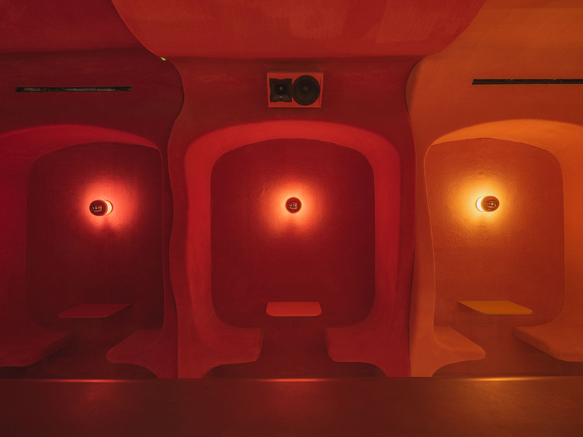 retro cocktail bar with multi-chrome lighting and curved steel hides behind barcelona focacceria - 6