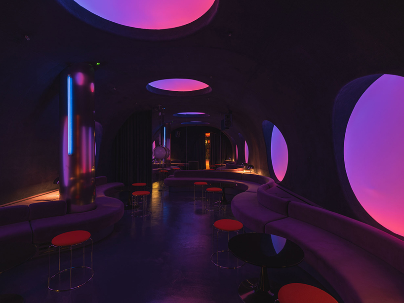 retro cocktail bar with multi-chrome lighting and curved steel hides behind barcelona focacceria - 9