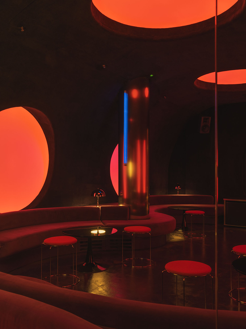 retro cocktail bar with multi-chrome lighting and curved steel hides behind barcelona focacceria - 8