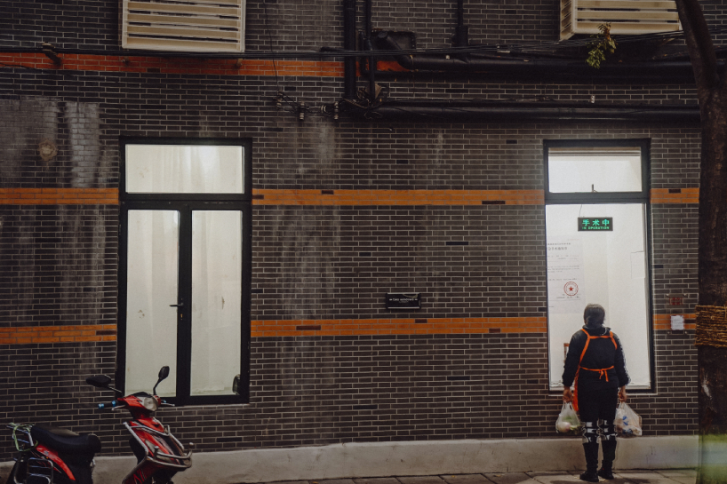 DEVOLUTION turns two windows into a contemporary art exhibition in shanghai designboom