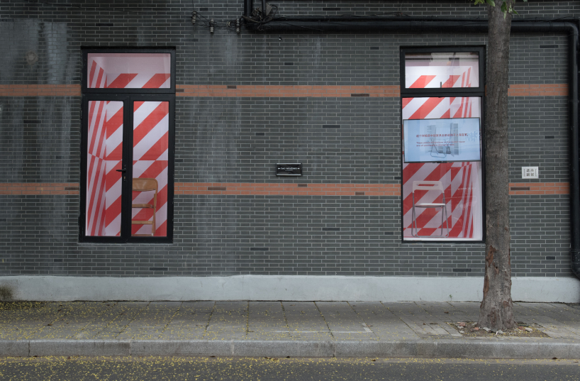 DEVOLUTION turns two windows into a contemporary art exhibition in shanghai designboom