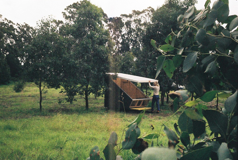 portable tiny house 'the coop' provides shelter within australian landscape