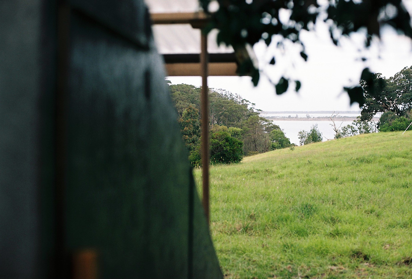 portable tiny house 'the coop' provides shelter within australian landscape