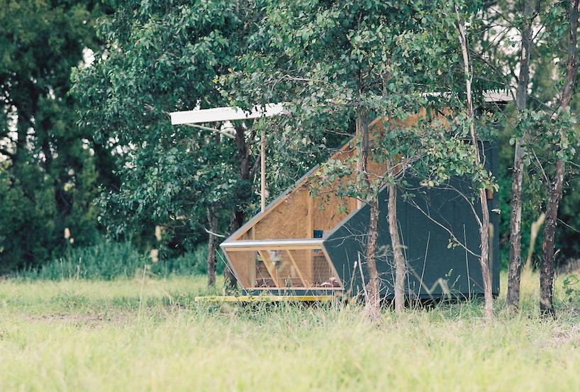 portable tiny house 'the coop' provides shelter within australian landscape