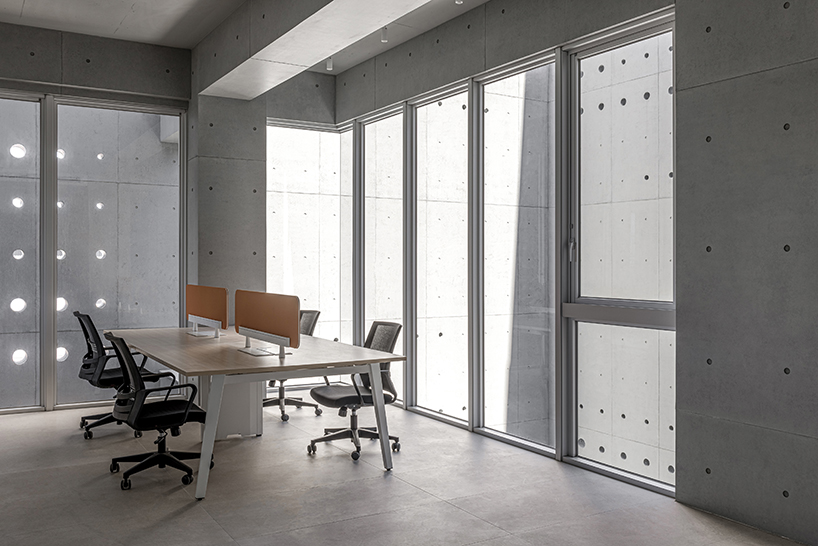 solar locus an interplay of light and shadow in a concreter cubic headquarters in taiwan 6