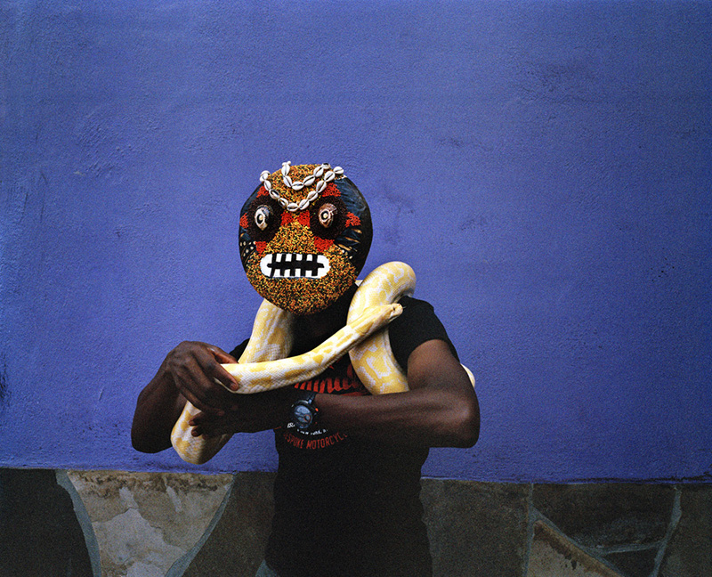 'amoji' depicts the clash between traditional and modern culture across africa designboom