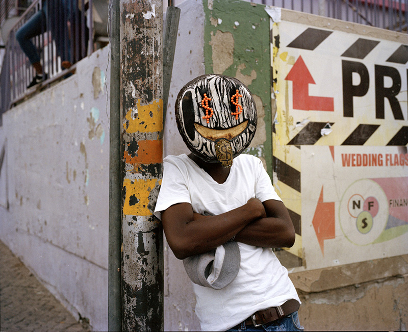 'amoji' depicts the clash between traditional and modern culture across africa designboom