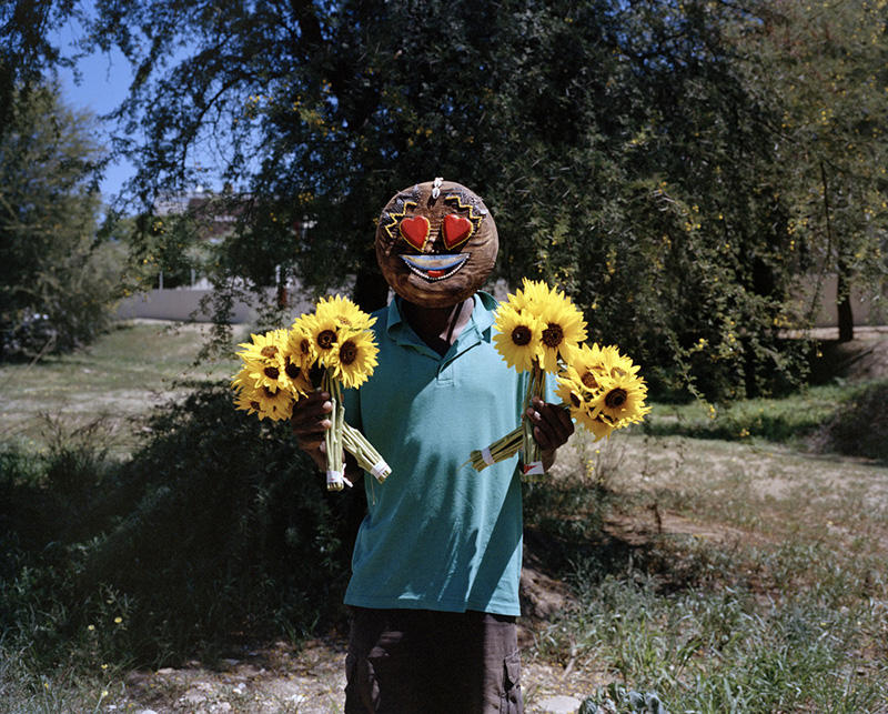 'amoji' depicts the clash between traditional and modern culture across africa designboom