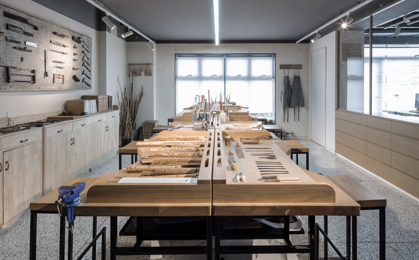 golucci brings japanese-style lines to a fan workshop in beijing designboom