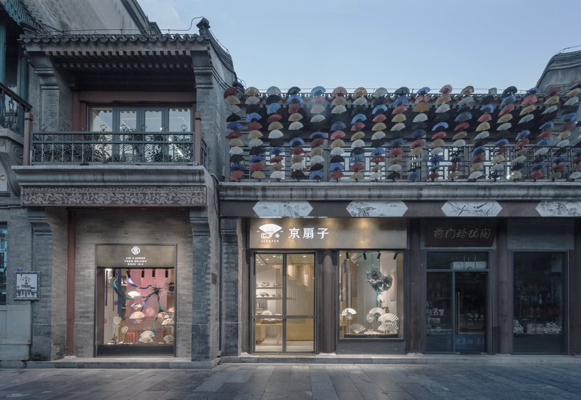 golucci brings japanese-style lines to a fan workshop in beijing designboom