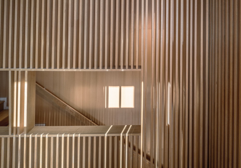 golucci brings japanese-style lines to a fan workshop in beijing designboom