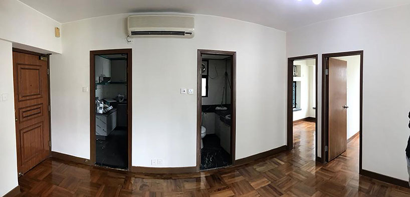 absence from island completes apartment interior in hong kong with rattan, wood + terrazzo