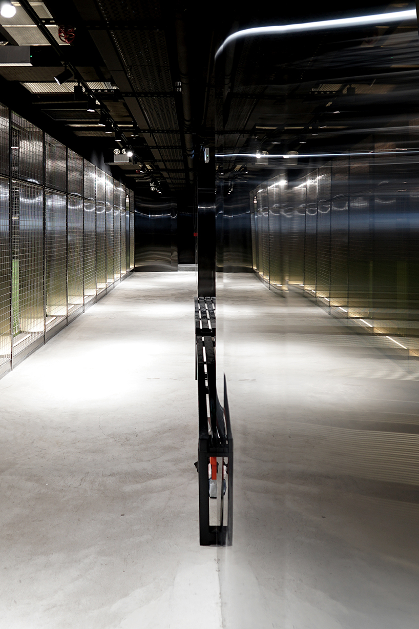 absence from island + studio etain ho turn a factory unit into a soccer pitch designboom