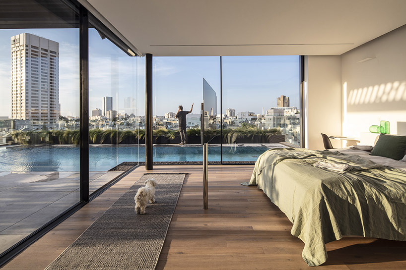 raz melamed’s SQ5 penthouse pool overlooks the bustling tel aviv skyline