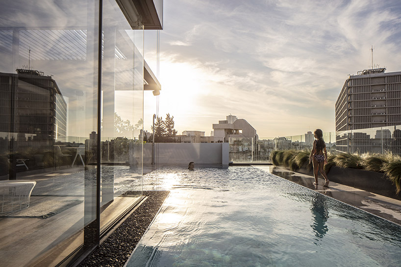 raz melamed’s SQ5 penthouse pool overlooks the bustling tel aviv skyline