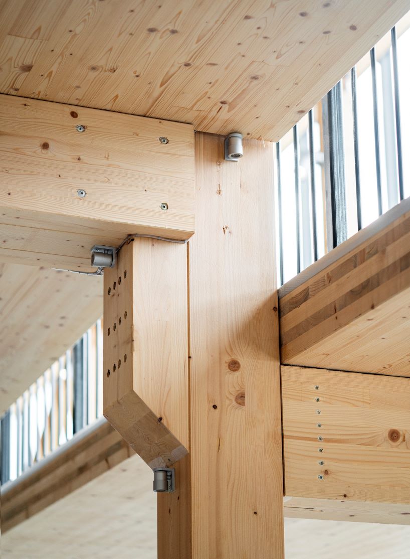 tengbom architects design sustainable triangular-shaped bicycle garage in sweden 