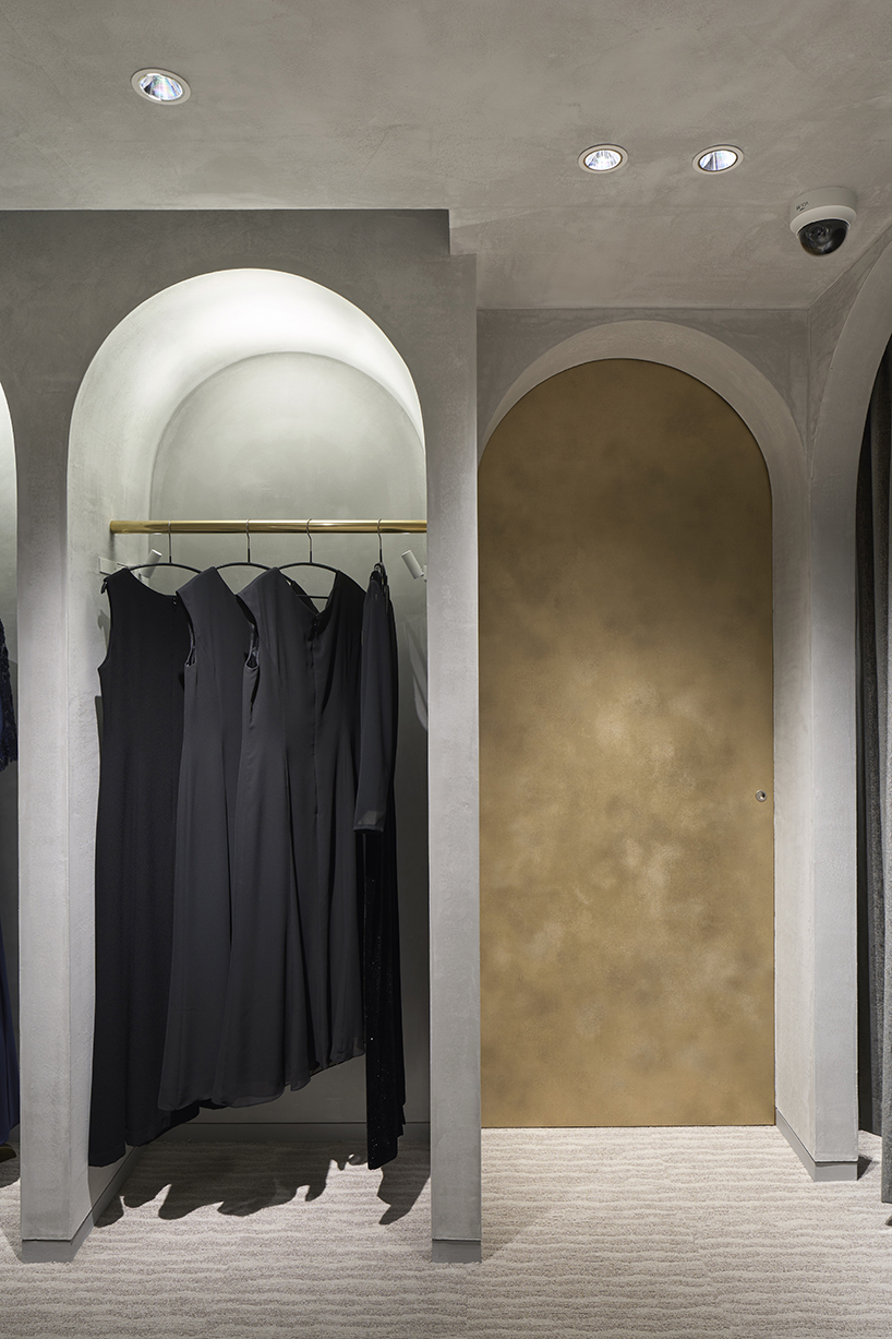 tsutsumi and associates forms labyrinth store in japan with romanesque concrete arches