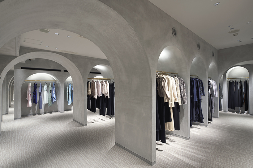 tsutsumi and associates forms labyrinth store in japan with romanesque concrete arches