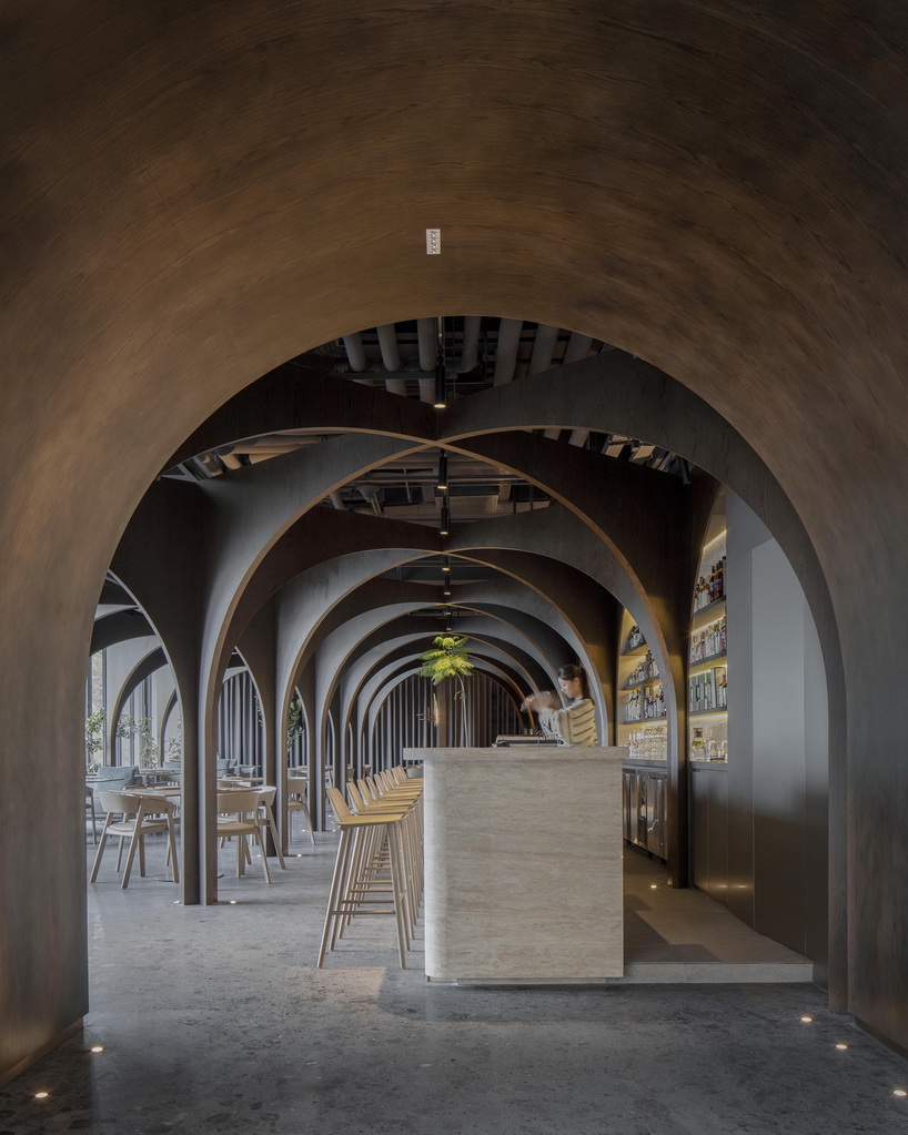sequence of arches stimulates curiosity within MARS studio's restaurant in china